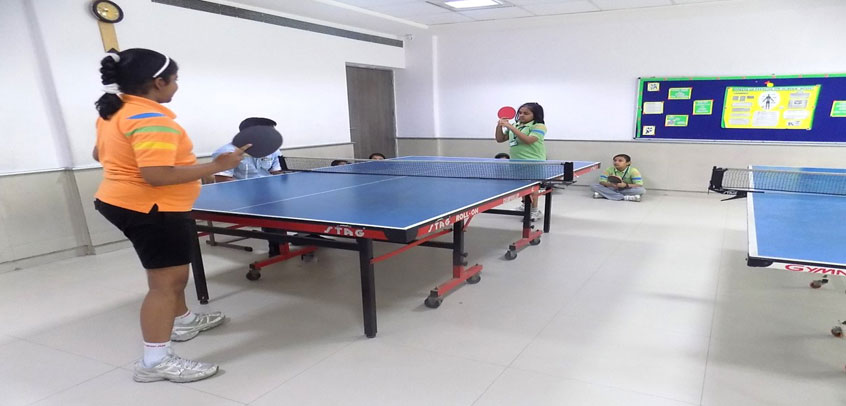 image shows the girl students playing table tennis,best school for sports in delhi
